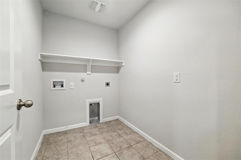 16745 Portage Street Justin, TX 76247 - Photo 16 of 16 a view of a hallway