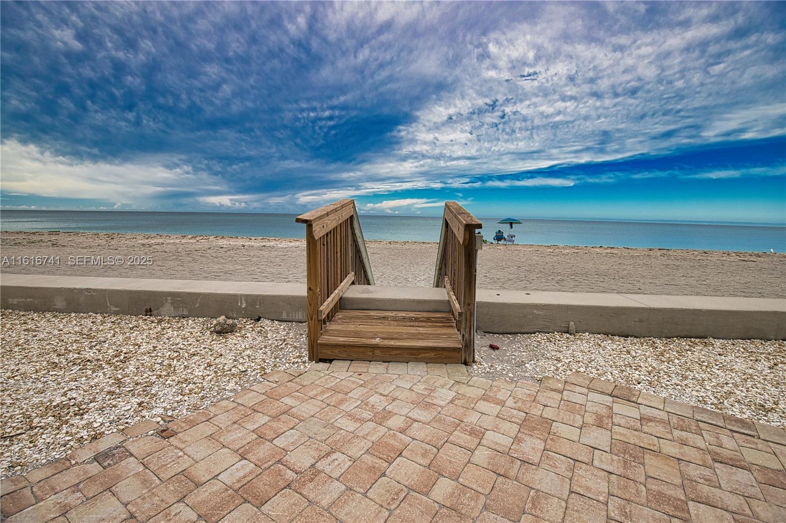 2810 North Beach Road, Unit D108 Englewood, FL 34223 - Photo 27 of 44 a view of entryway with wooden floor