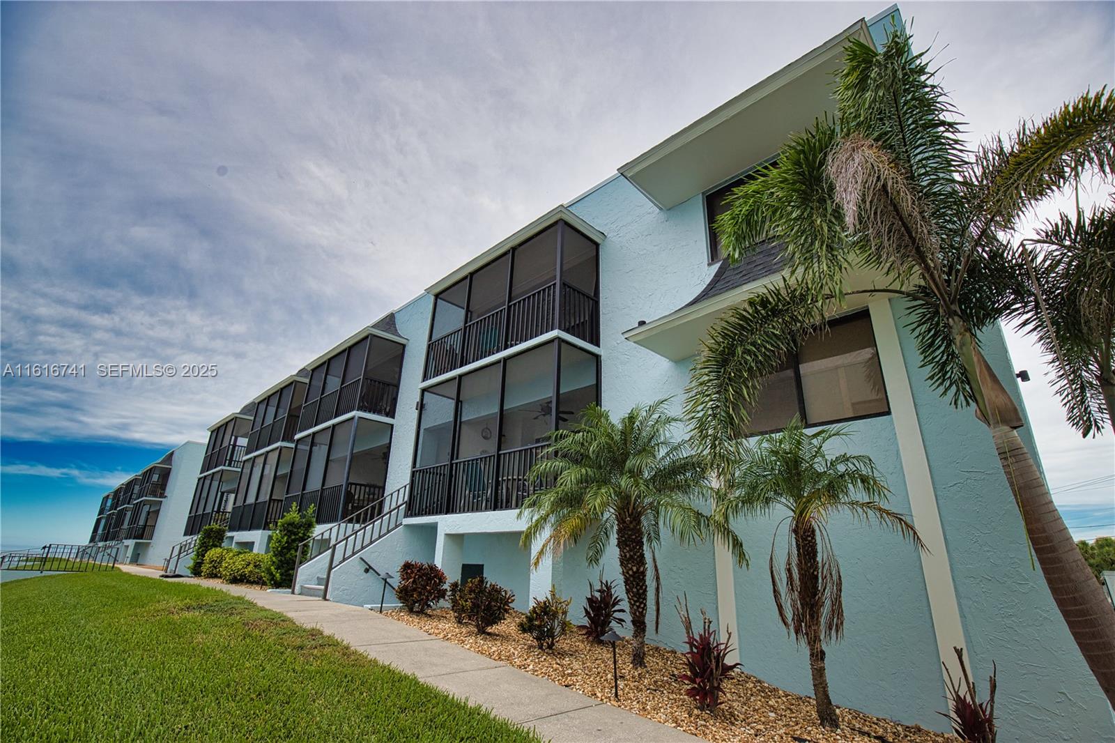 2810 North Beach Road, Unit D108 Englewood, FL 34223 - Photo 6 of 44 a view of front of house with a yard