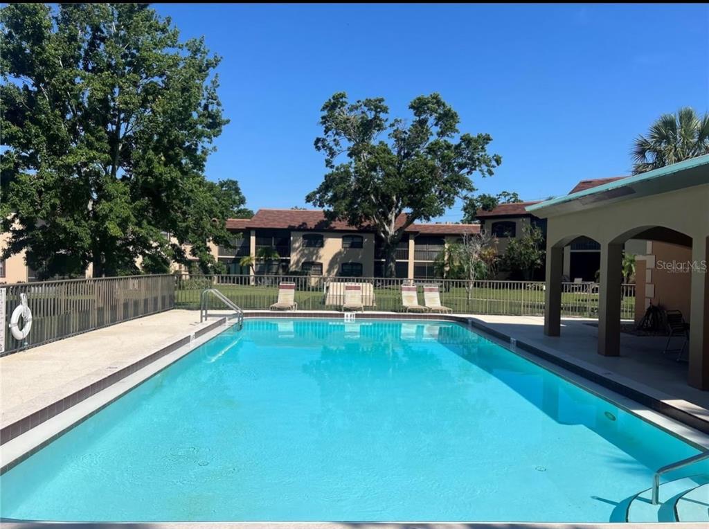 12900 Vonn Road, Unit B202 Largo, FL 33774 - Photo 20 of 23 a view of a house with pool