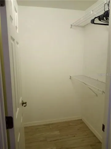 a view of small space with racks on the wall