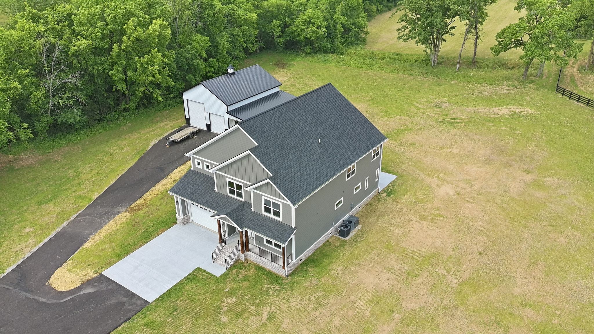 3319 Booker Ridge Road Mount Pleasant, TN 38474 - Photo 7 of 51 an aerial view of a house with swimming pool and a yard