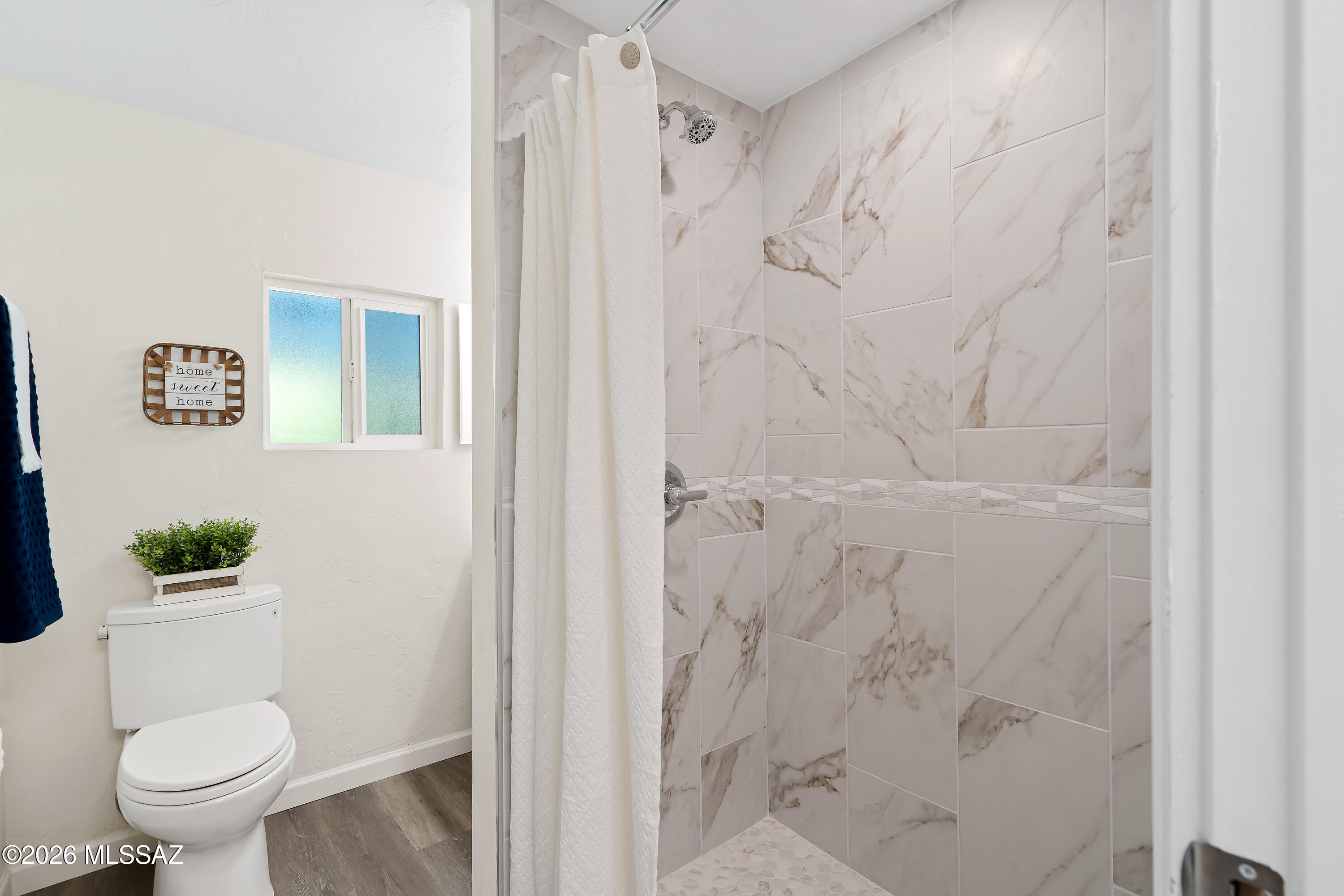 3150 East Presidio Road Tucson, AZ 85716 - Photo 12 of 33 Updated primary bathroom with new tile shower.