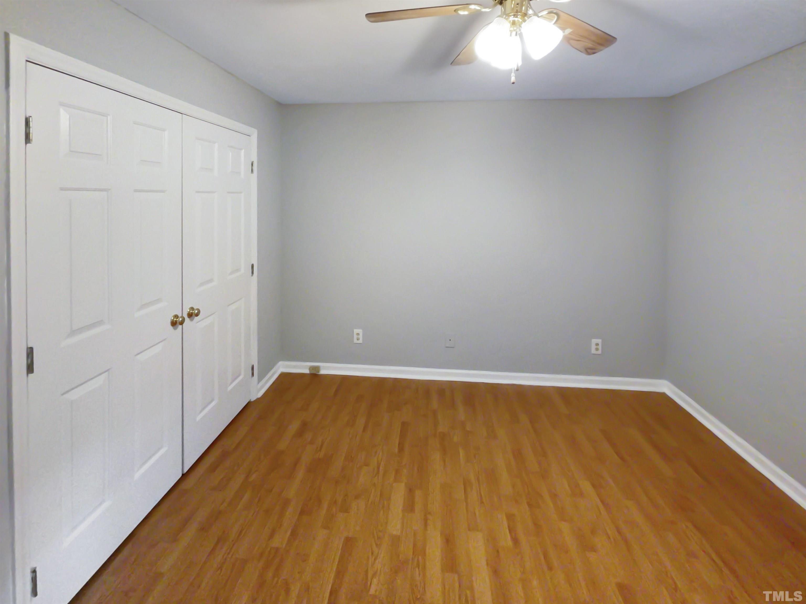200 Lassiter Farm Road Raleigh, NC 27603 - Photo 13 of 19 a view of a room with wooden floor and white walls