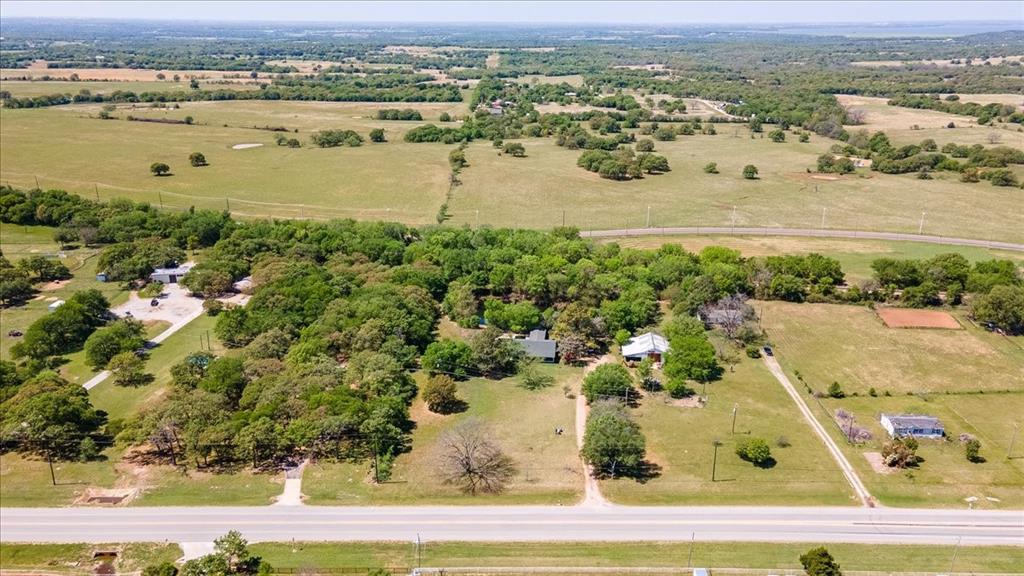 8293 Highway 377 Pilot Point, TX 76258 - Photo 8 of 14 an aerial view of ocean with residential houses with outdoor space