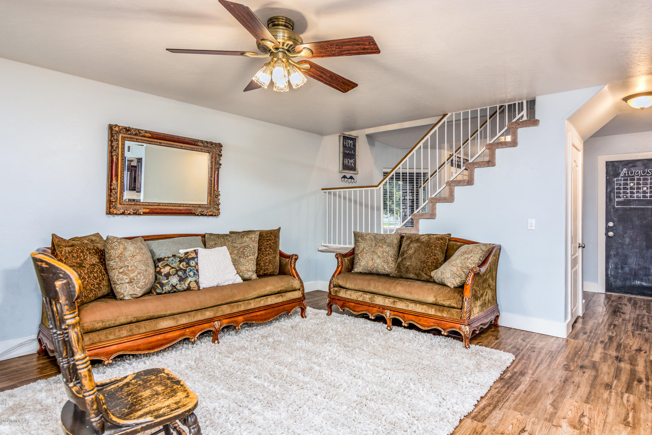2644 East Del Rio Street Gilbert, AZ 85295 - Photo 14 of 42 a living room with furniture and a rug