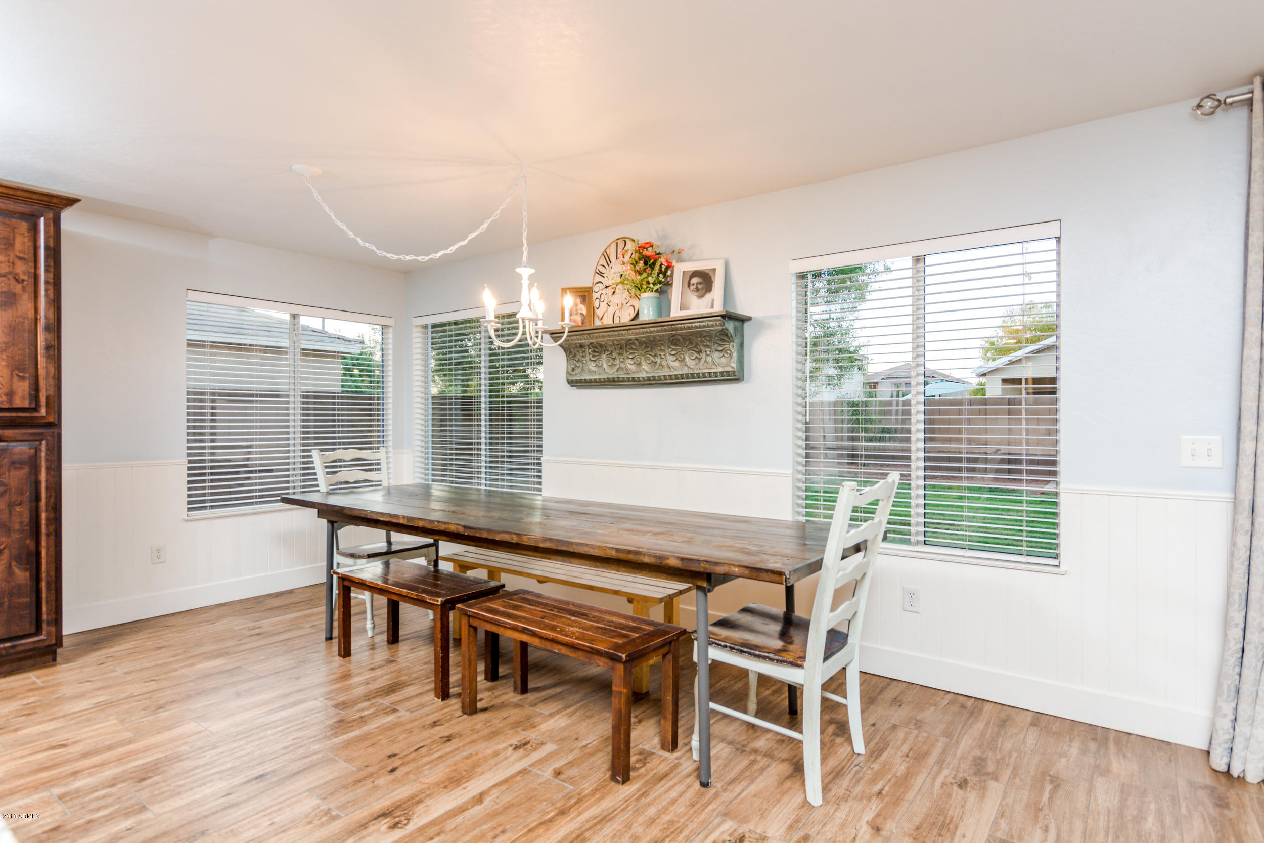 2644 East Del Rio Street Gilbert, AZ 85295 - Photo 16 of 42 a room with a table and a window