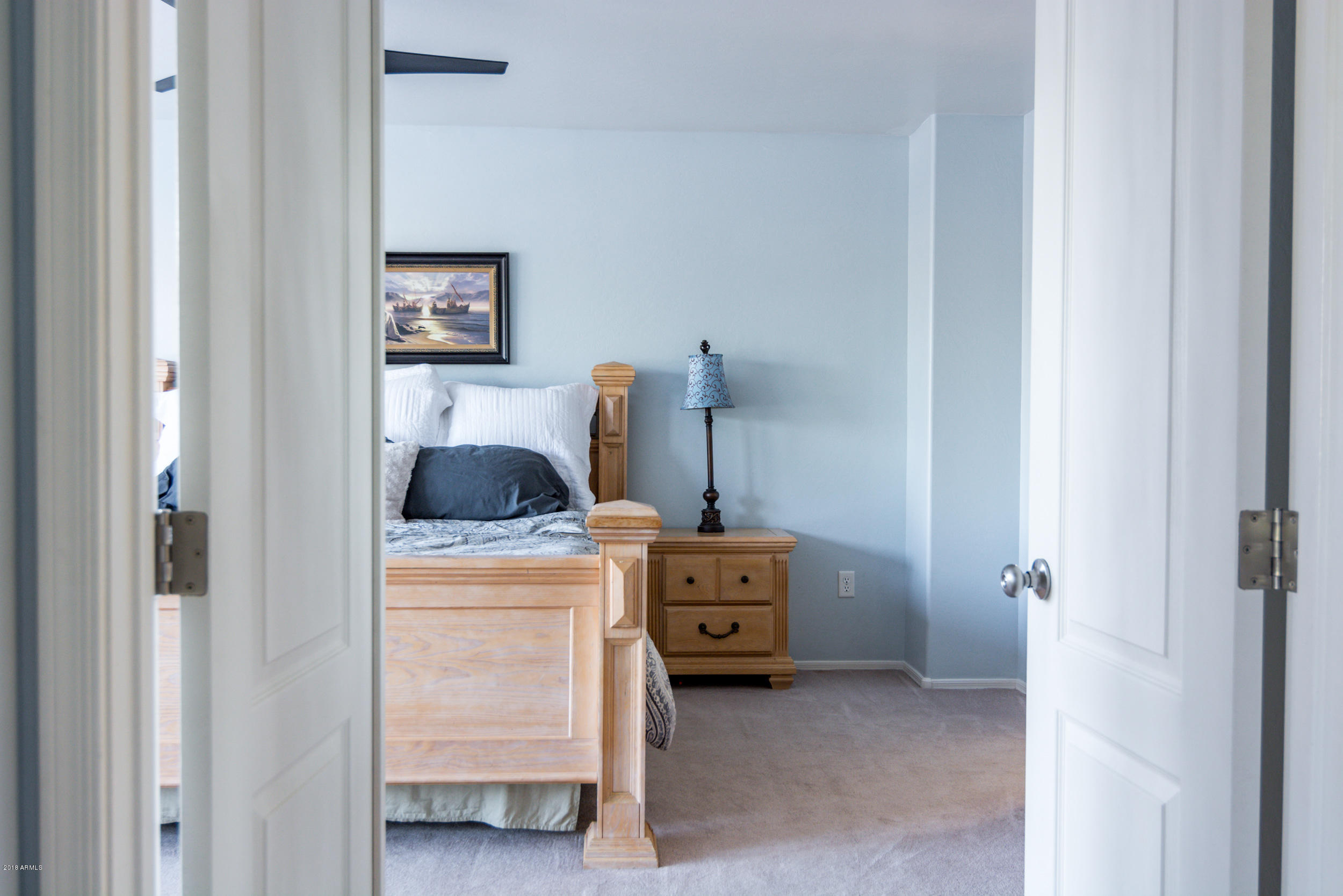 2644 East Del Rio Street Gilbert, AZ 85295 - Photo 17 of 42 a bedroom with a bed and a closet
