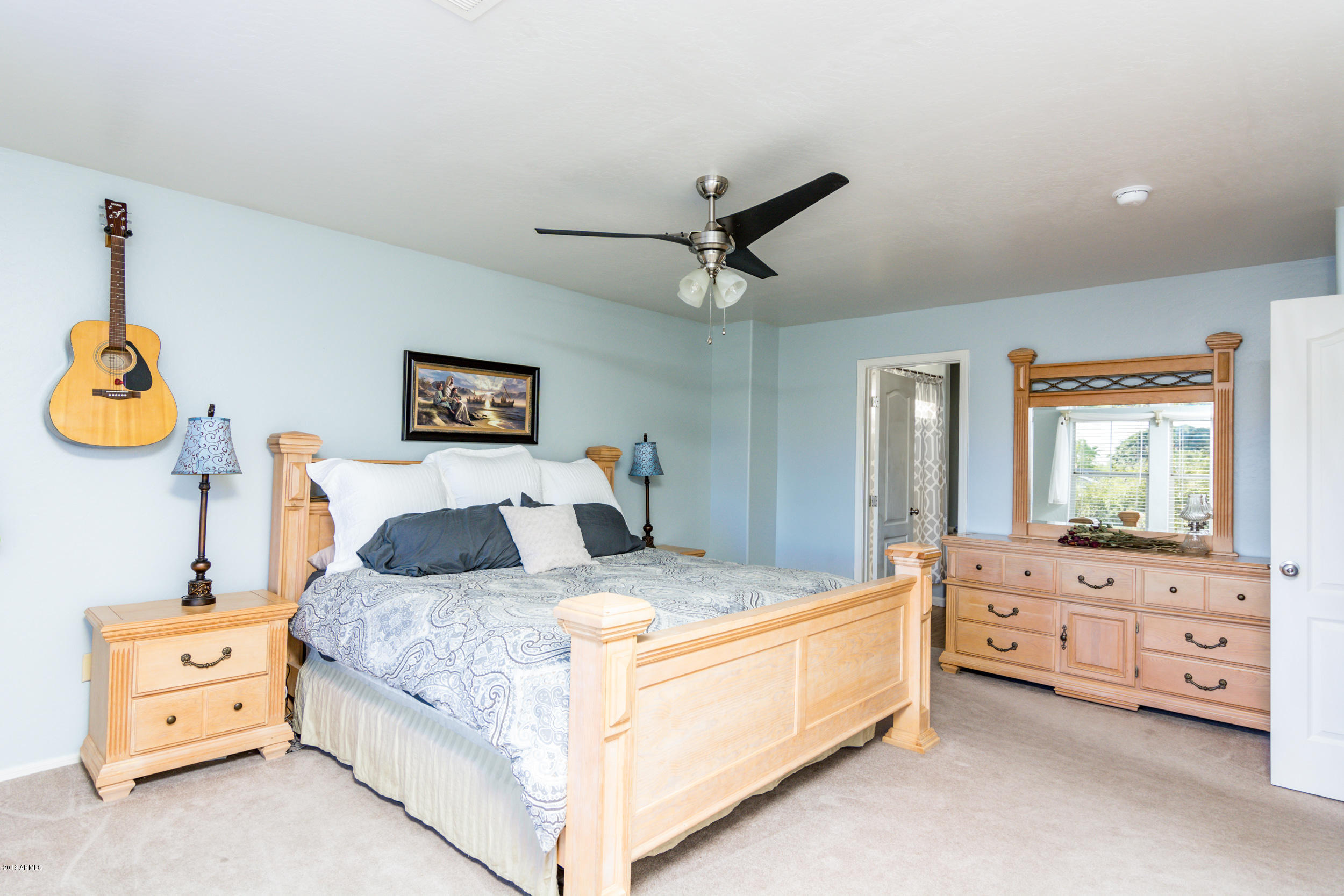 2644 East Del Rio Street Gilbert, AZ 85295 - Photo 20 of 42 a bedroom with a bed and a dresser