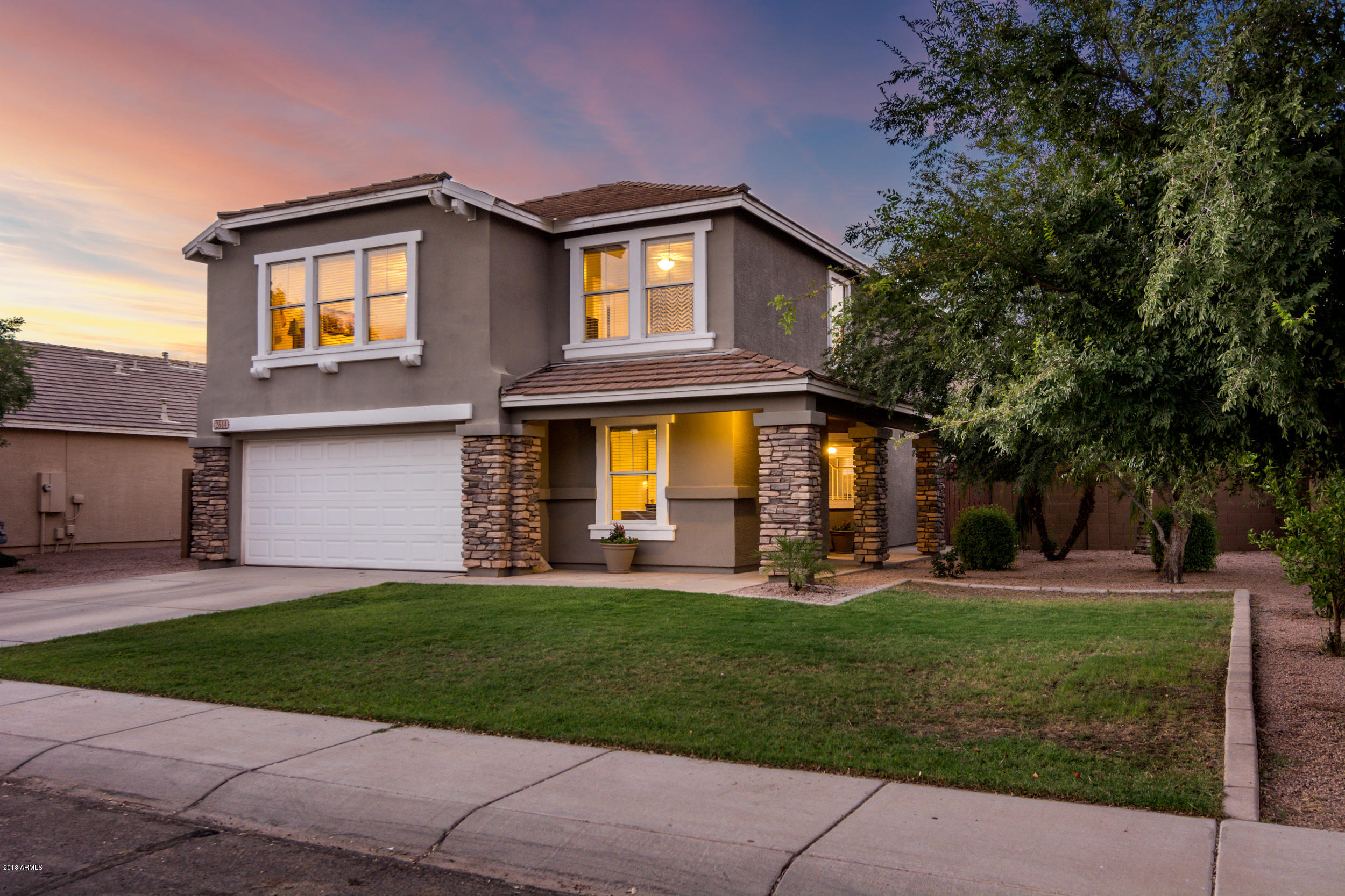 2644 East Del Rio Street Gilbert, AZ 85295 - Photo 2 of 42 a front view of house with yard and green space