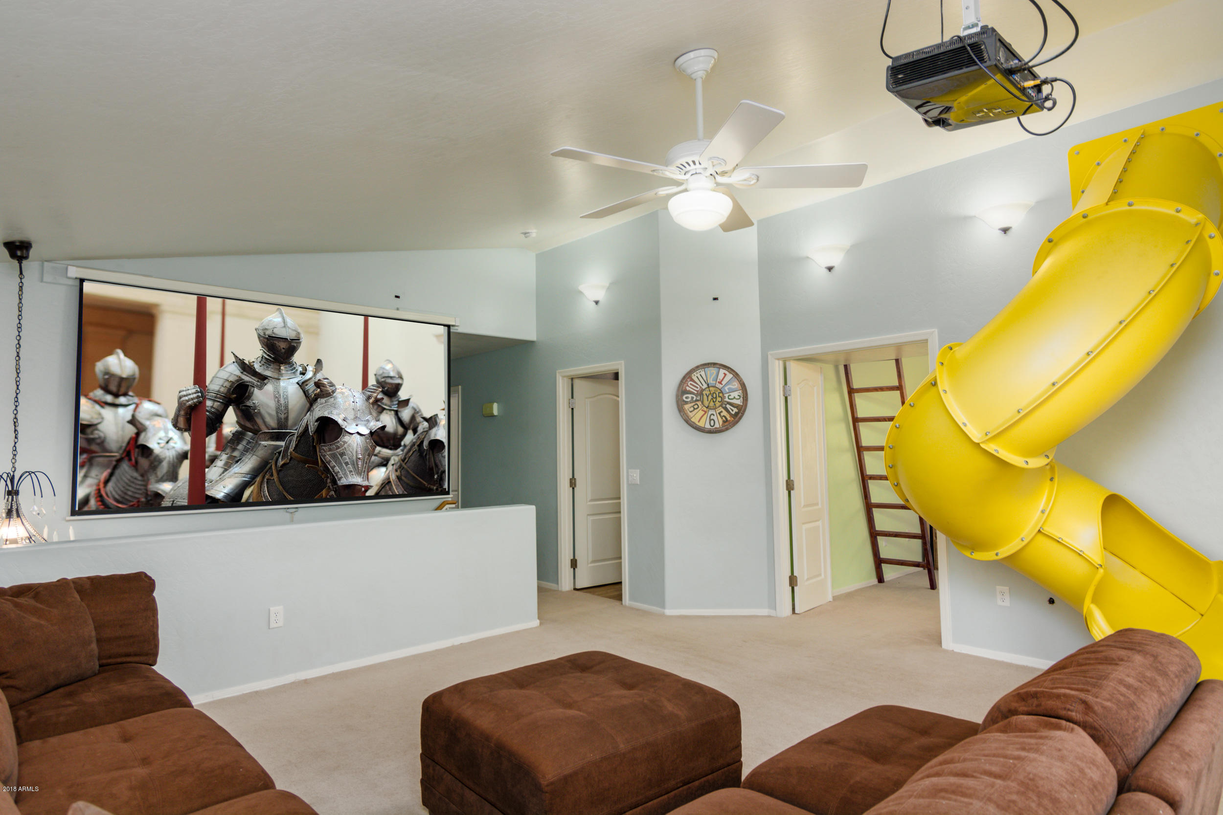 2644 East Del Rio Street Gilbert, AZ 85295 - Photo 23 of 42 a living room with furniture and a large mirror with a large window