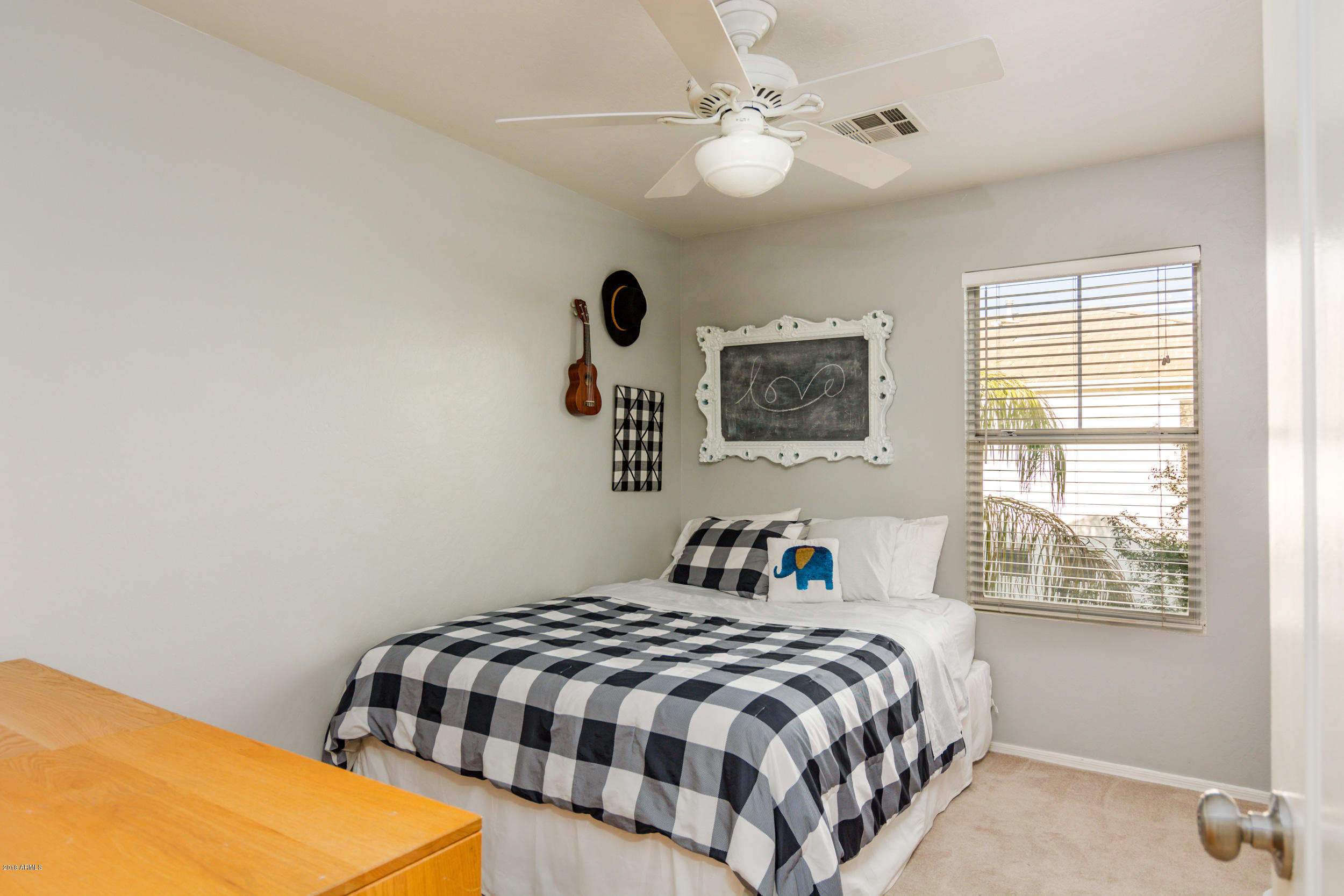 2644 East Del Rio Street Gilbert, AZ 85295 - Photo 28 of 42 a bedroom with a bed and a window
