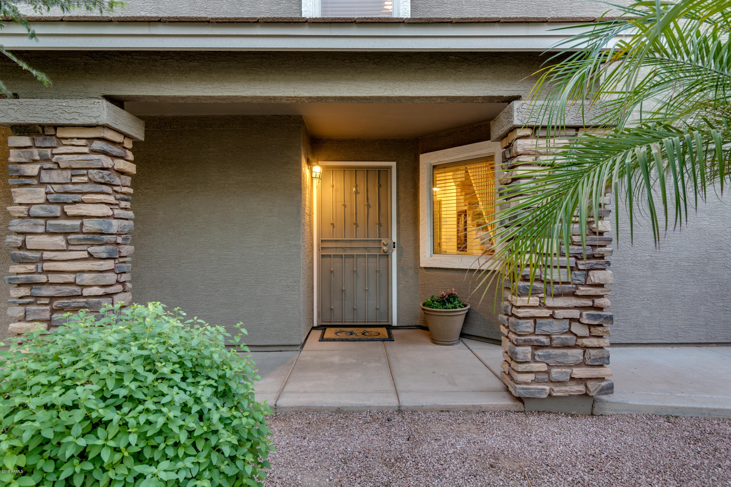 2644 East Del Rio Street Gilbert, AZ 85295 - Photo 4 of 42 a door view of a house with a yard