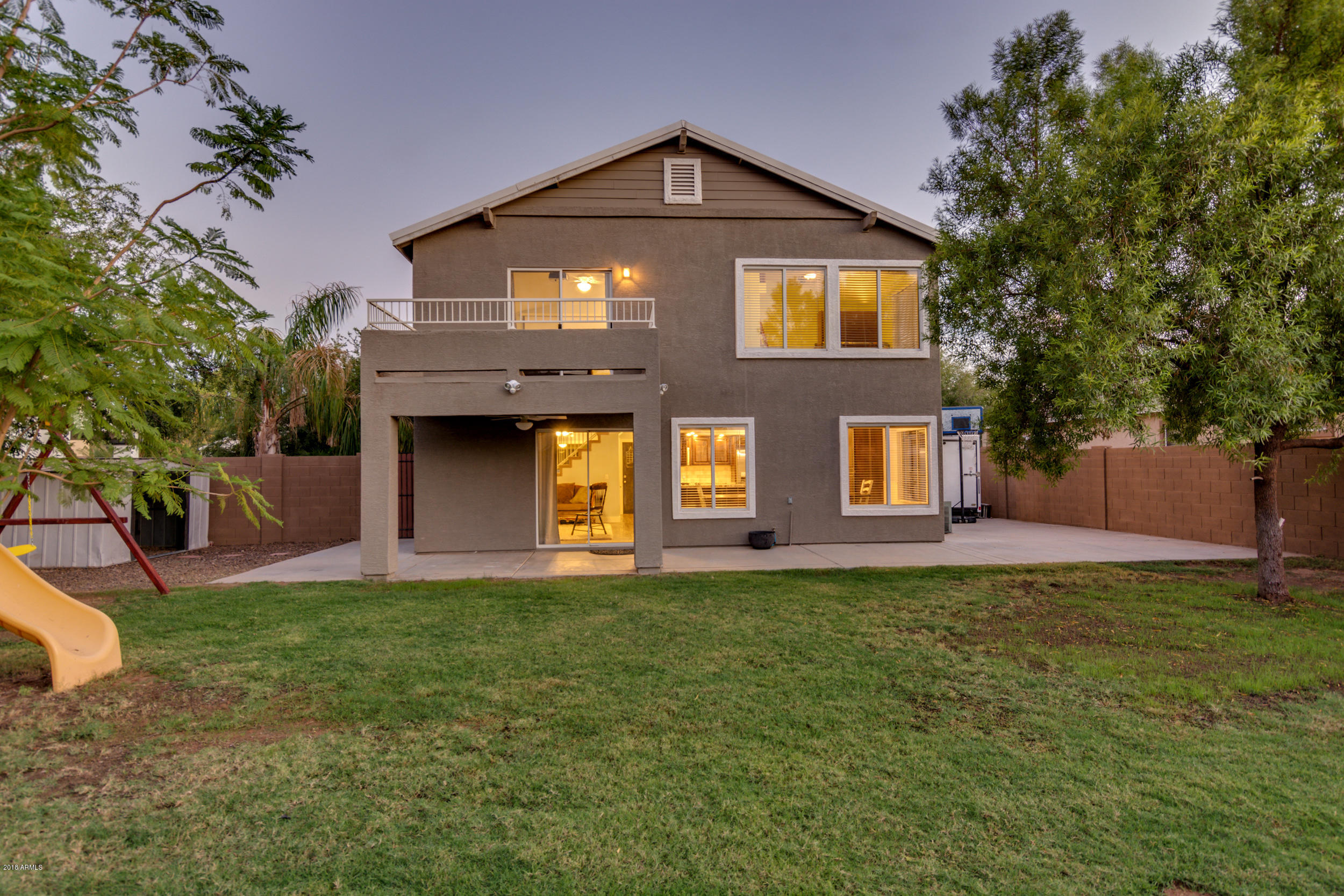 2644 East Del Rio Street Gilbert, AZ 85295 - Photo 42 of 42 a front view of a house with a yard and garage