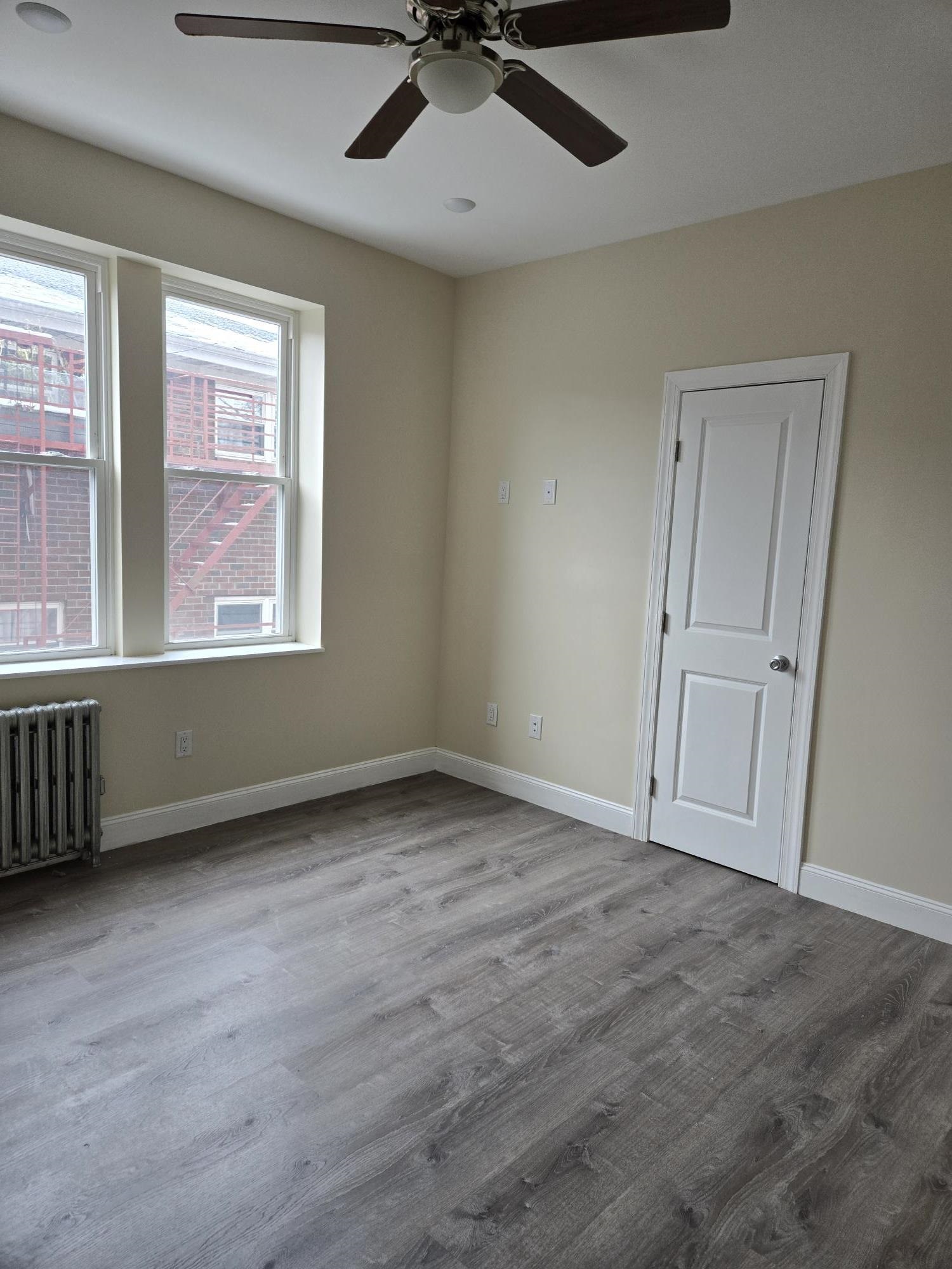 289 Day Avenue, Unit B2 Fairview, NJ 07022 - Photo 3 of 6 a view of an empty room with a window