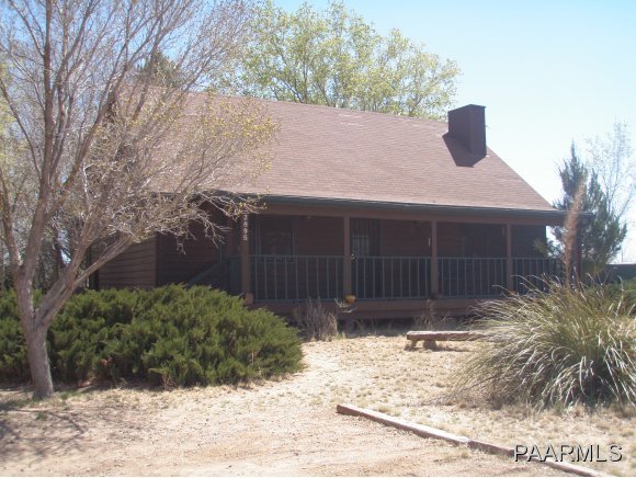 2895 North Reed Road, Unit 1 Chino Valley, AZ 86323 - Photo 1 of 22 a front view of a house with a yard