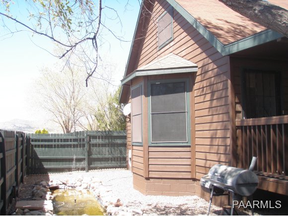 2895 North Reed Road, Unit 1 Chino Valley, AZ 86323 - Photo 5 of 22 a view of a house with a fence