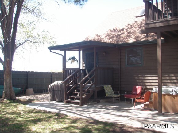2895 North Reed Road, Unit 1 Chino Valley, AZ 86323 - Photo 6 of 22 a view of a house with backyard porch and sitting area