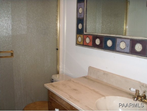 2895 North Reed Road, Unit 1 Chino Valley, AZ 86323 - Photo 9 of 22 a bathroom with a stove and a sink