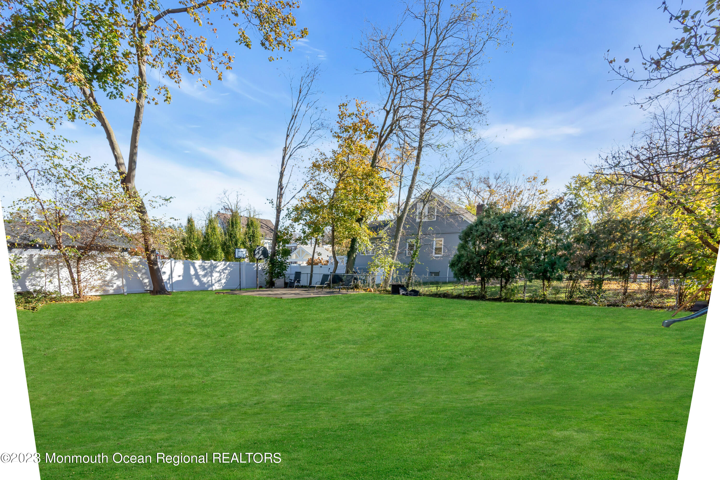 225 Oakhurst Road Oakhurst, NJ 07755 - Photo 17 of 20 a view of a trees with a big yard