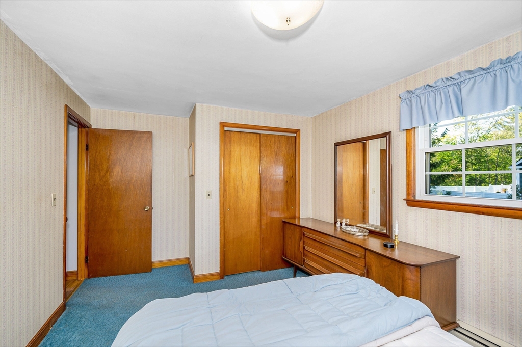 24 Arcadia Road Billerica, MA 01821 - Photo 14 of 24 a bedroom with a bed and a window