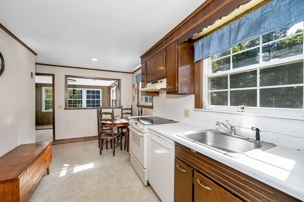 24 Arcadia Road Billerica, MA 01821 - Photo 5 of 24 a kitchen with a sink a counter top space and cabinets