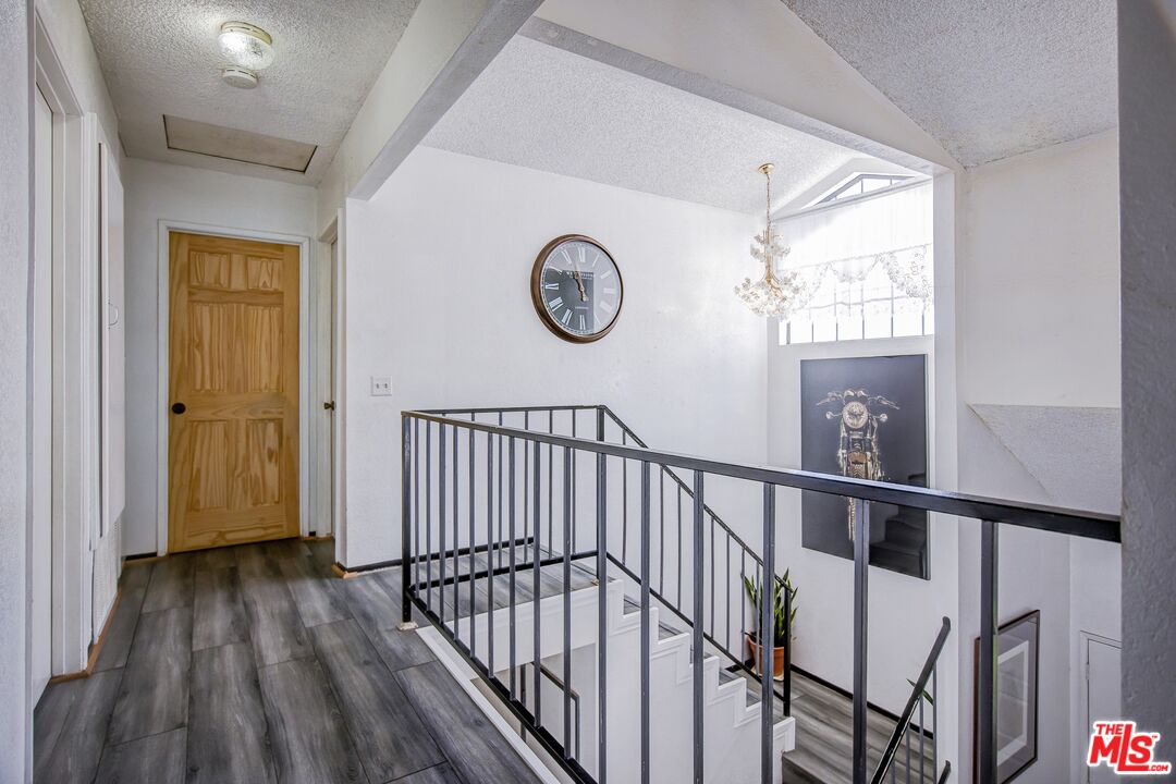 981 West Long Beach Drive Colton, CA 92324 - Photo 16 of 33 a view of entryway with wooden floor