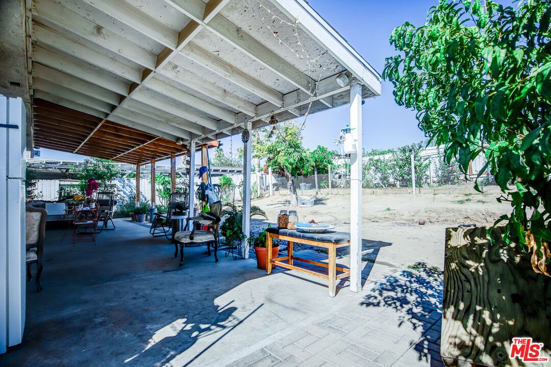 981 West Long Beach Drive Colton, CA 92324 - Photo 26 of 33 a view of porch with seating space