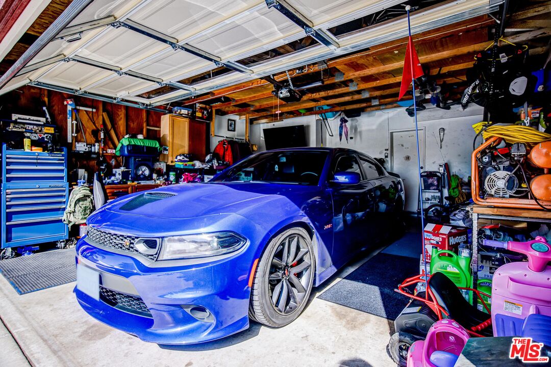 981 West Long Beach Drive Colton, CA 92324 - Photo 29 of 33 a view of a car in garage