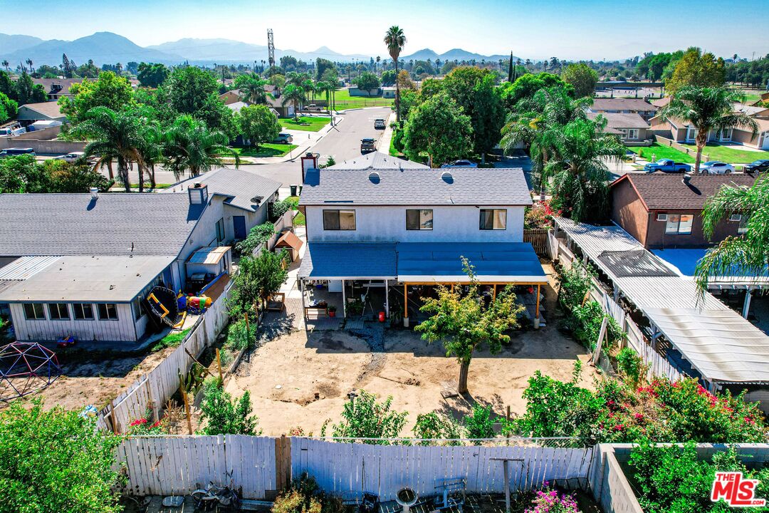 981 West Long Beach Drive Colton, CA 92324 - Photo 31 of 33 an aerial view of house with a yard and outdoor seating