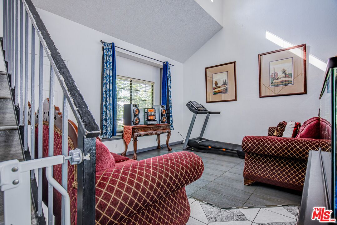 981 West Long Beach Drive Colton, CA 92324 - Photo 6 of 33 a living room with furniture and a rug