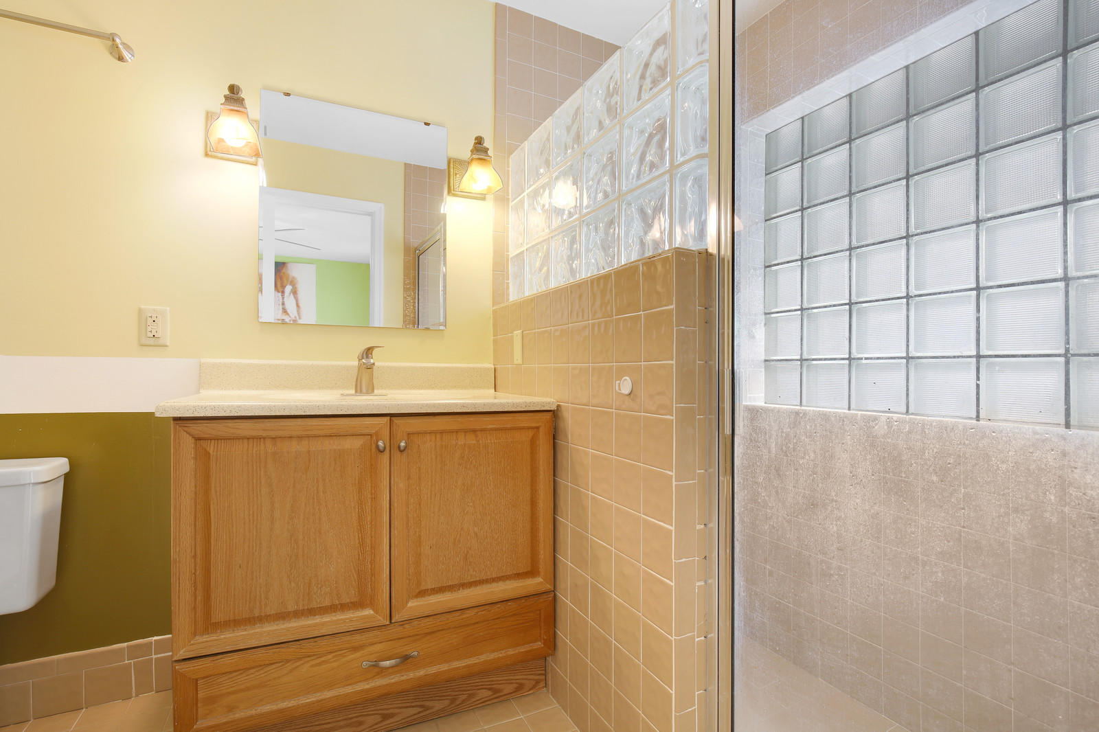 2144 Park Place Boca Raton, FL 33486 - Photo 12 of 20 a bathroom with a sink and a mirror