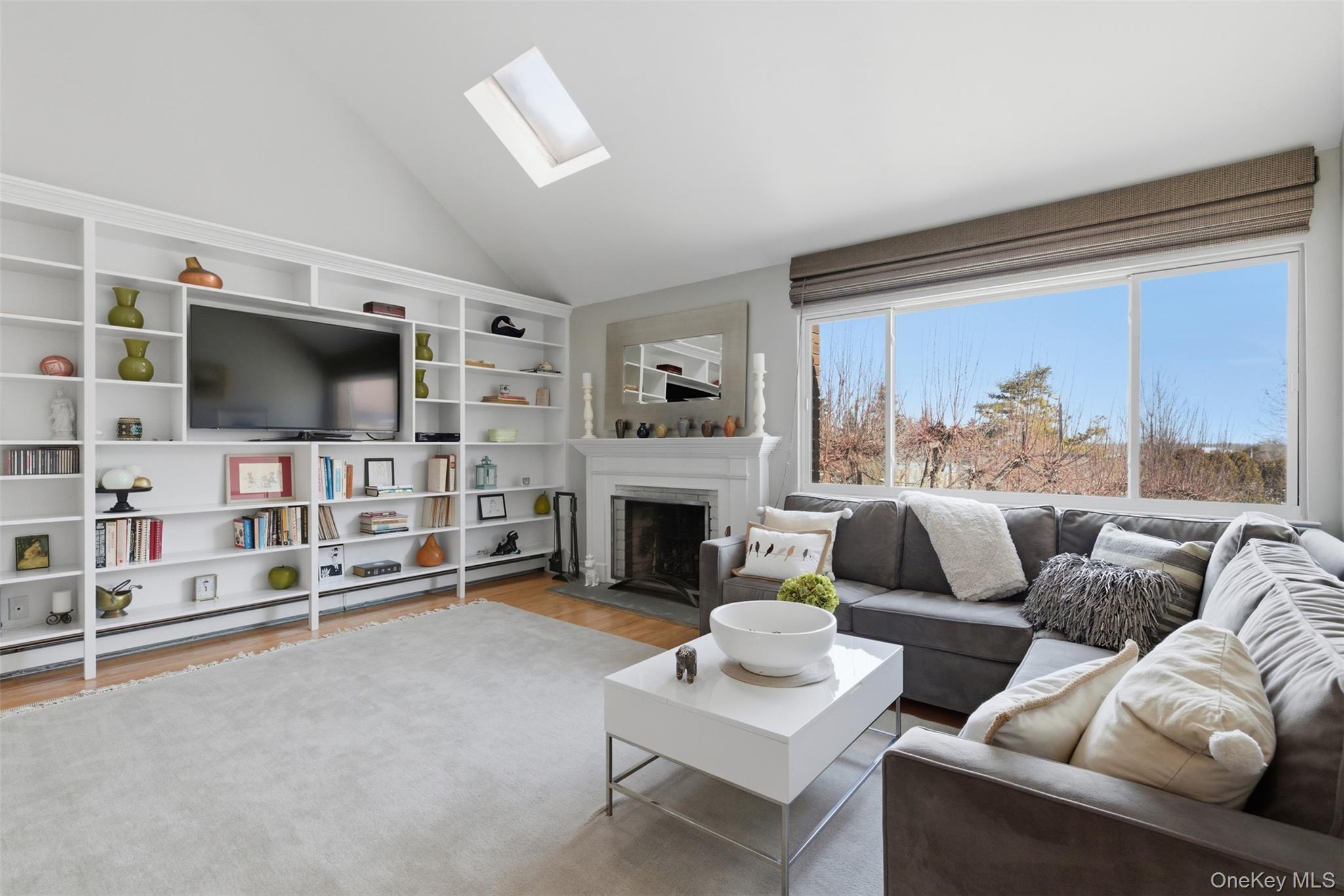 10 Bayberry Lane Rye Brook, NY 10573 - Photo 20 of 44 Main Entertaining Area with Fireplace and Built in Book Shelves