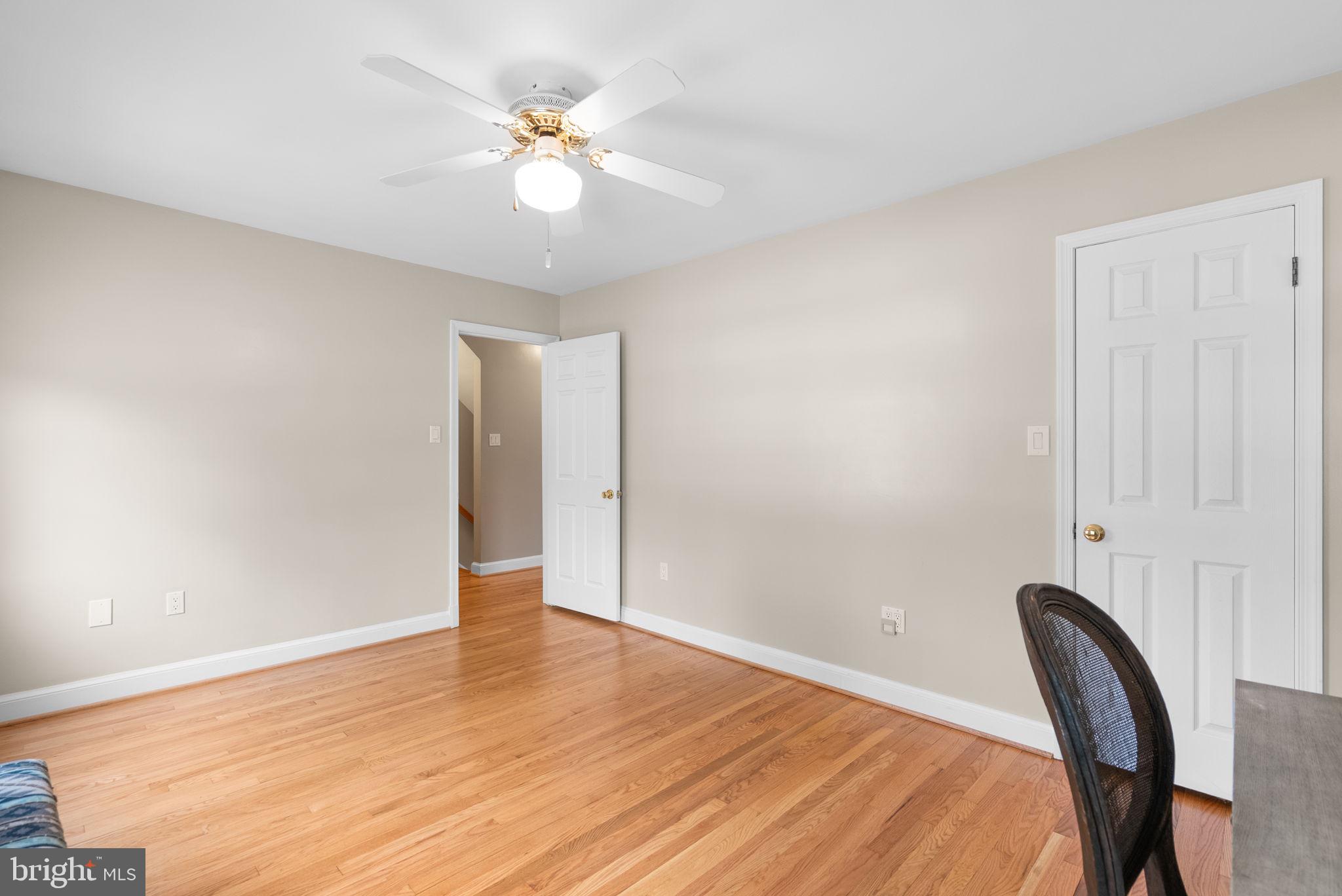 211 Olney Sandy Spring Road Ashton, MD 20861 - Photo 17 of 49 a view of a livingroom with a workspace