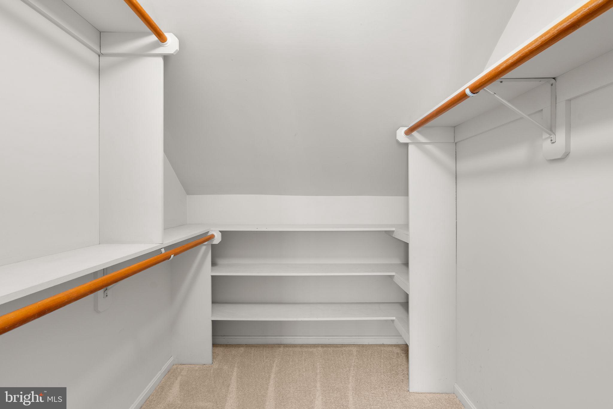 211 Olney Sandy Spring Road Ashton, MD 20861 - Photo 27 of 49 a view of walk in closet with empty racks