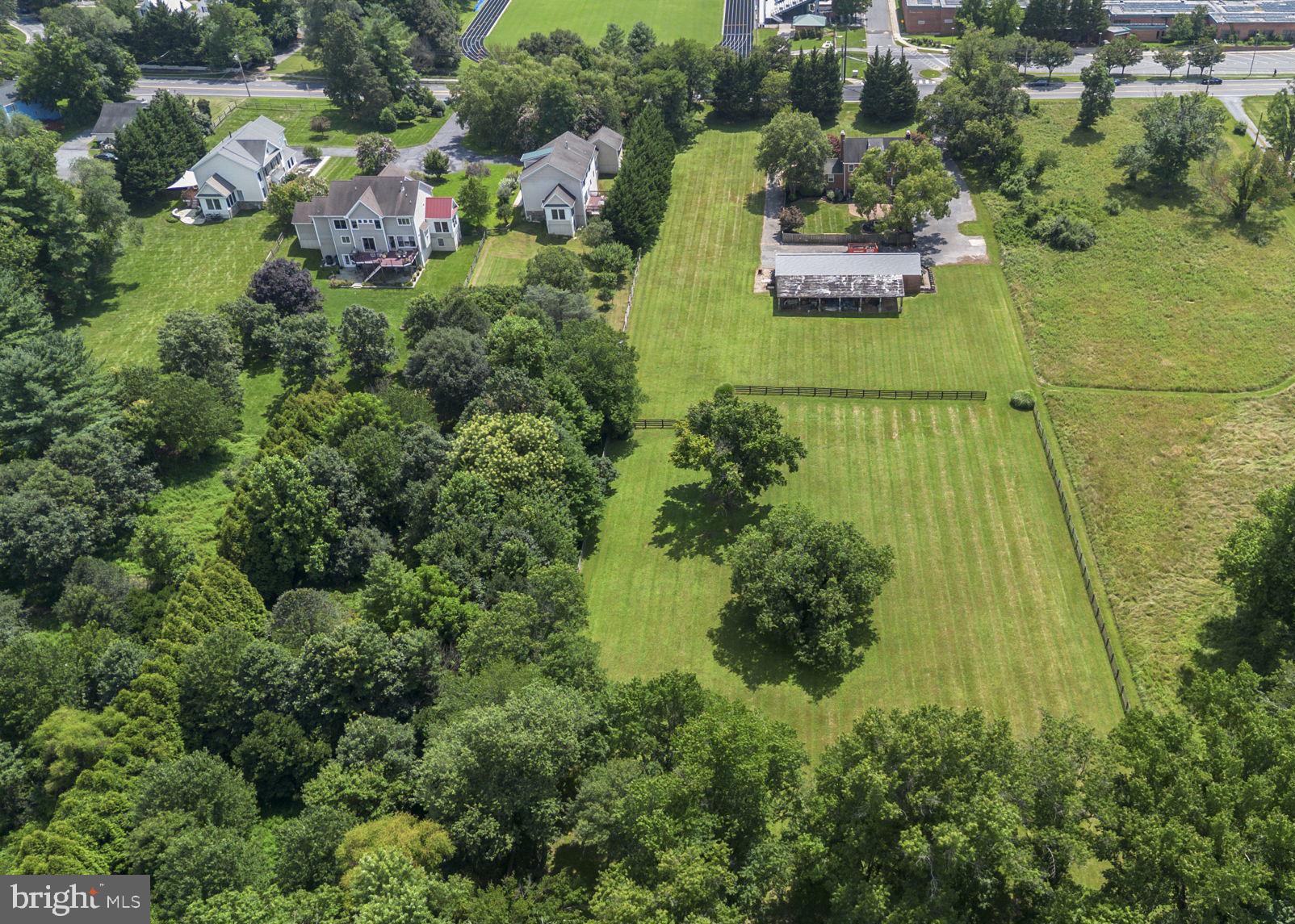 211 Olney Sandy Spring Road Ashton, MD 20861 - Photo 3 of 49 an aerial view of residential house with outdoor space and swimming pool