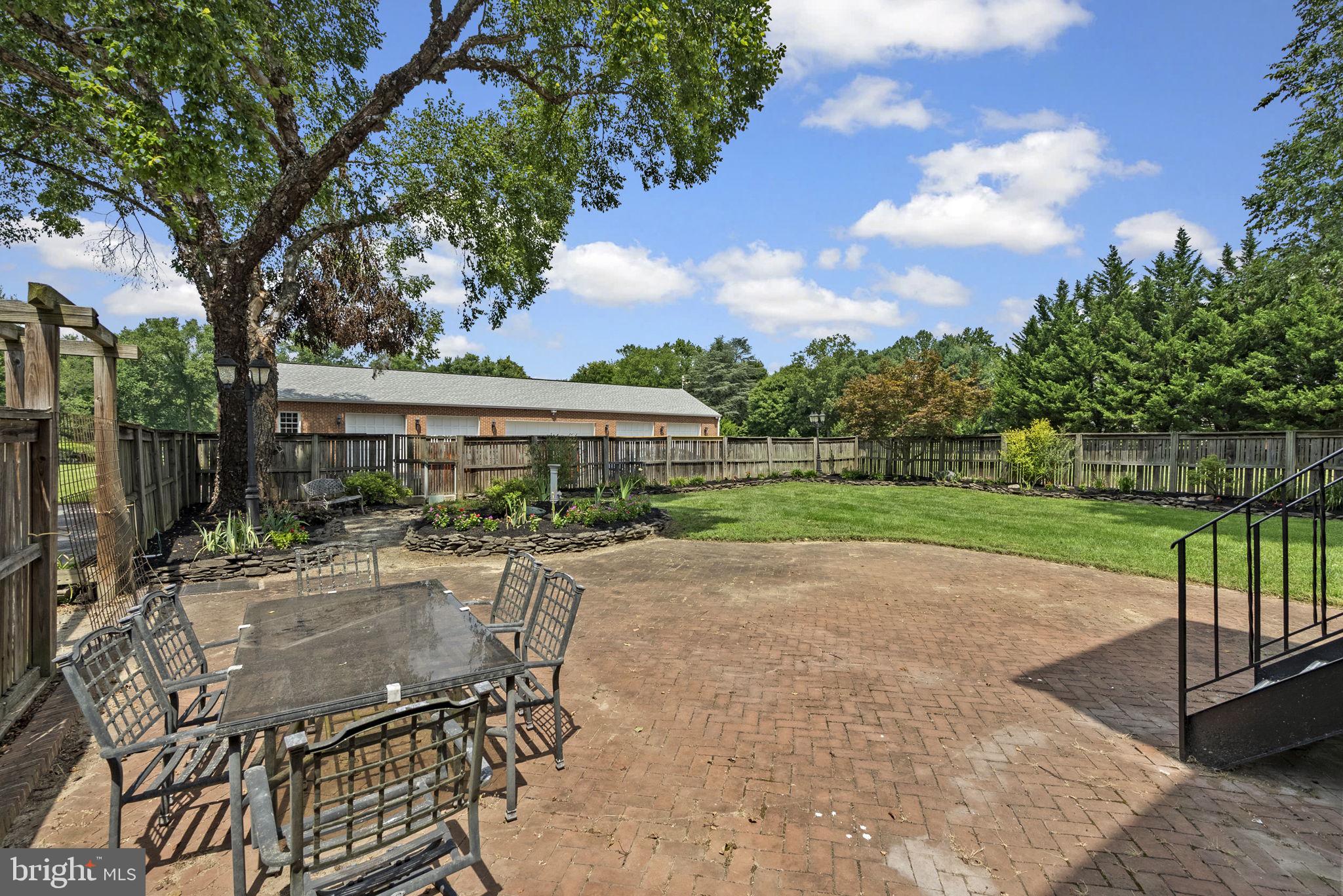 211 Olney Sandy Spring Road Ashton, MD 20861 - Photo 35 of 49 a view of a house with backyard and sitting area