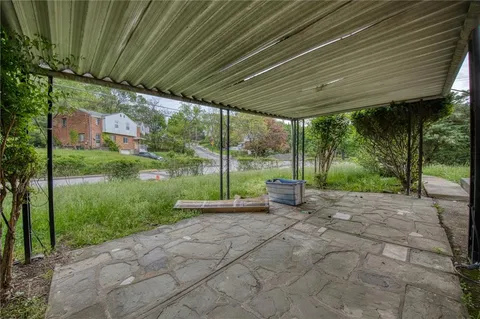 a view of a backyard with garden