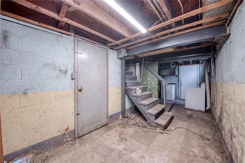 a view of a hallway with seating area