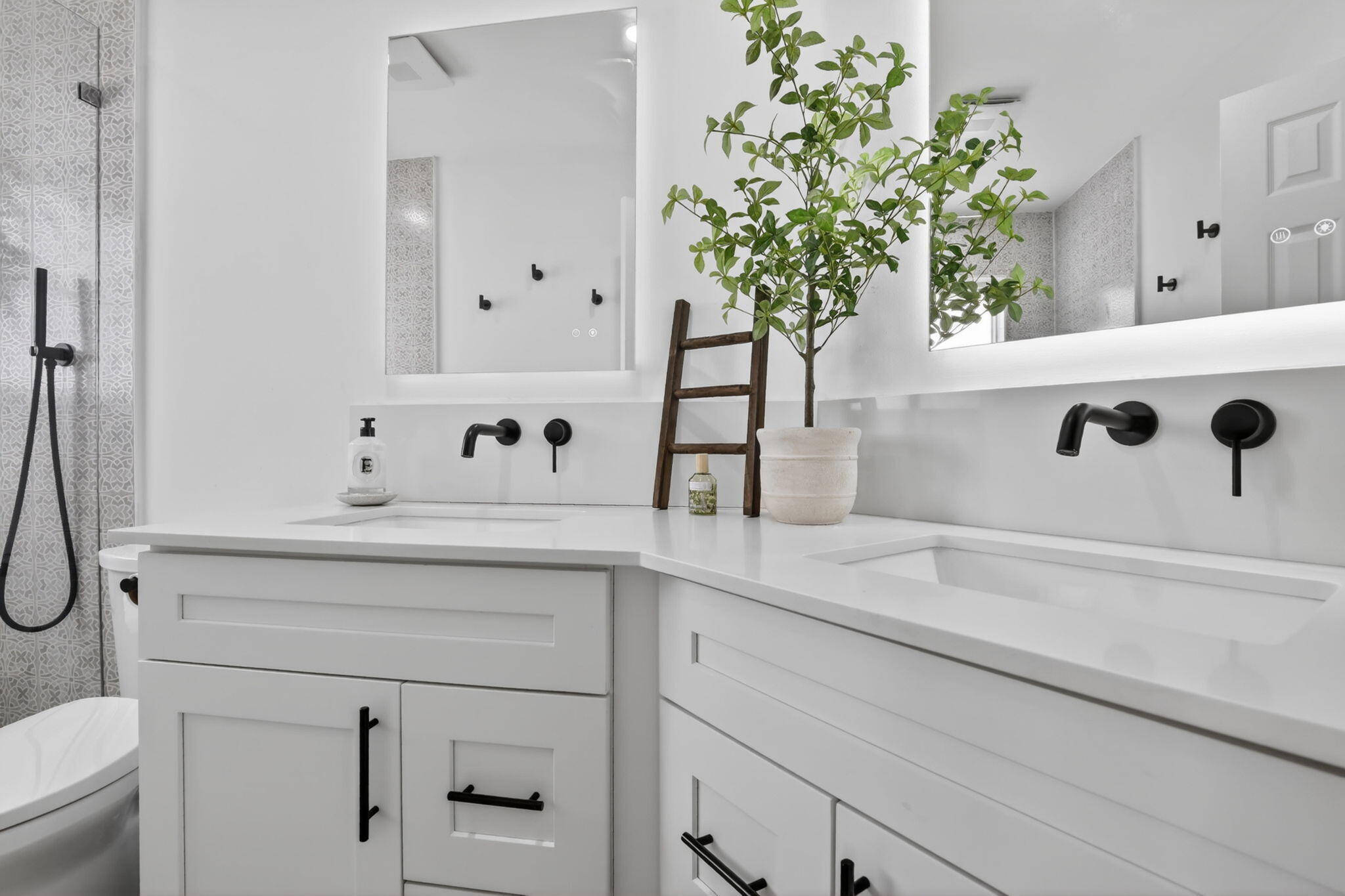 4299 Laurel Ridge Circle Weston, FL 33331 - Photo 59 of 103 a bathroom with a sink a toilet and mirror
