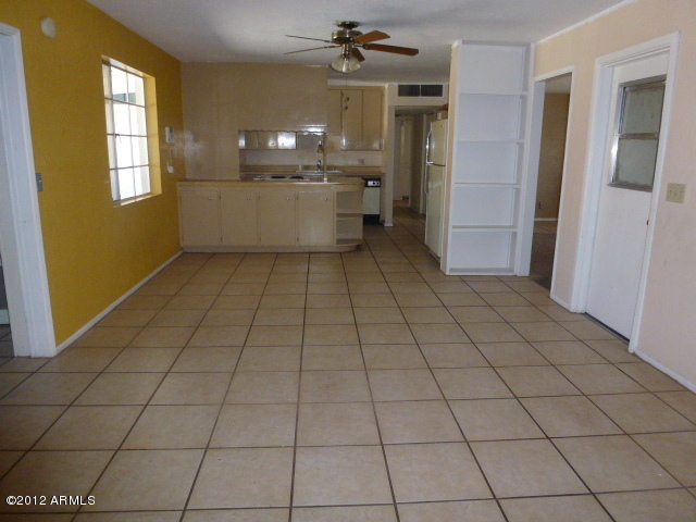 3032 West Bloomfield Road Phoenix, AZ 85029 - Photo 22 of 32 a room view with a window and chandelier