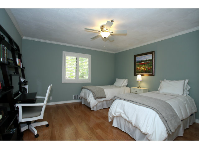 1115 Continentals Way, Unit 203 Belmont, CA 94002 - Photo 12 of 16 a bedroom with bed and window