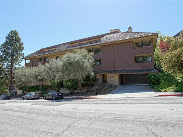 1115 Continentals Way, Unit 203 Belmont, CA 94002 - Photo 16 of 16 a front view of a house with a garden