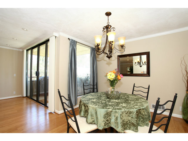 1115 Continentals Way, Unit 203 Belmont, CA 94002 - Photo 3 of 16 a view of a living room and a wooden floor
