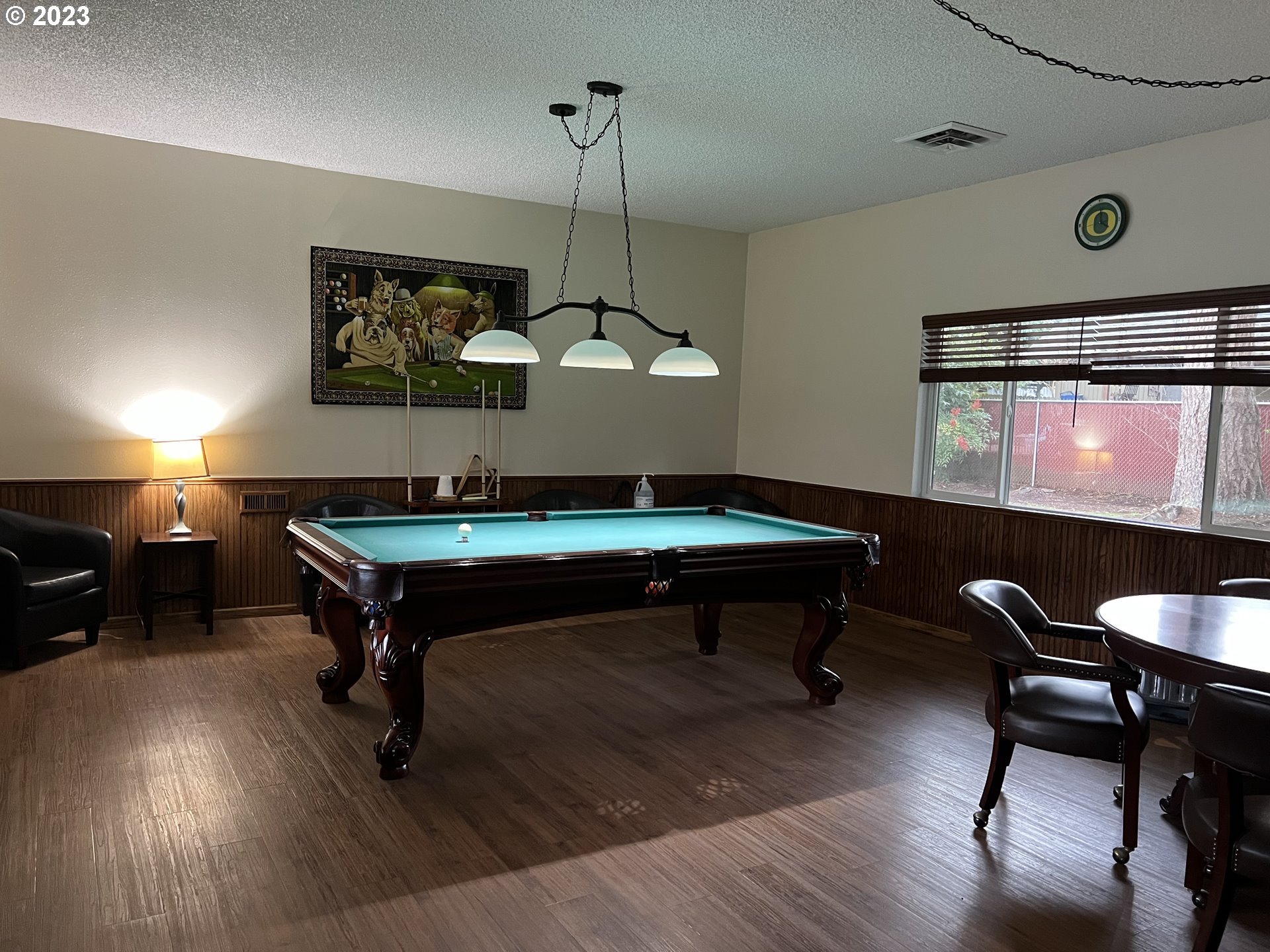 1475 Green Acres Road, Unit 142 Eugene, OR 97408 - Photo 13 of 14 a room with furniture pool table and wooden floor