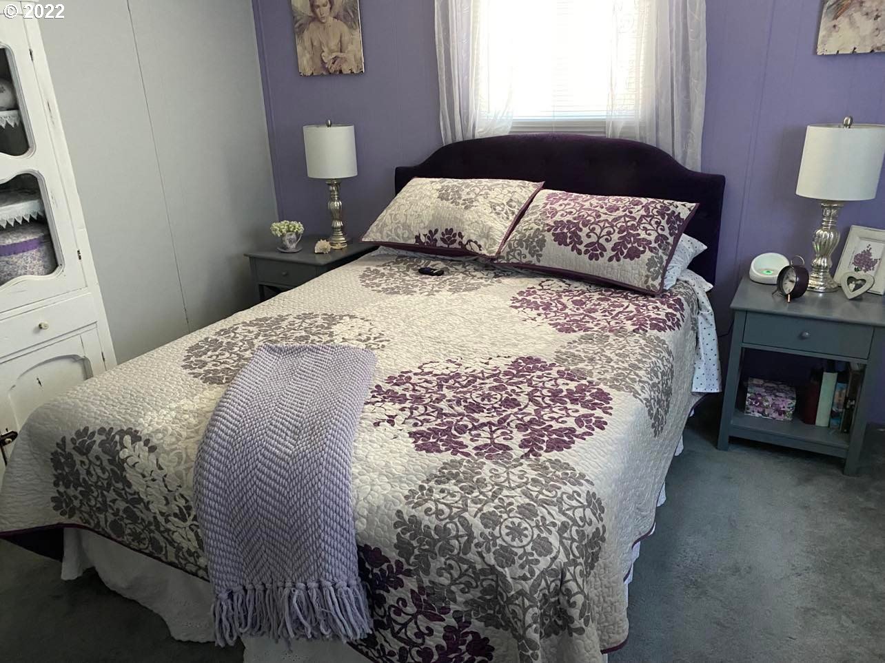 1475 Green Acres Road, Unit 142 Eugene, OR 97408 - Photo 4 of 14 a bedroom with a bed and a window