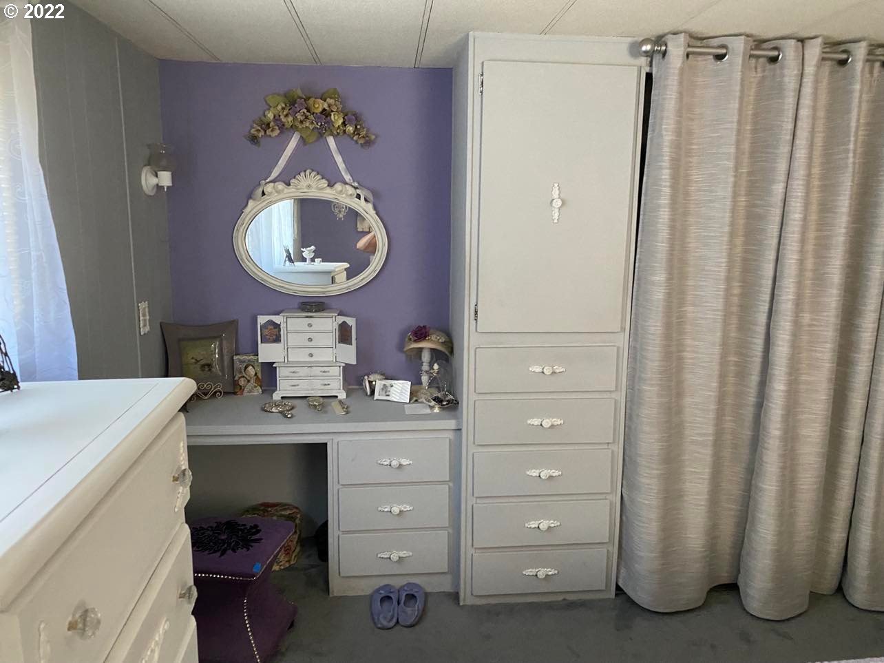 1475 Green Acres Road, Unit 142 Eugene, OR 97408 - Photo 5 of 14 a room with a cabinets and a mirror