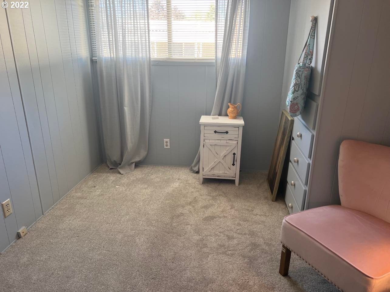 1475 Green Acres Road, Unit 142 Eugene, OR 97408 - Photo 6 of 14 a room with furniture and a window