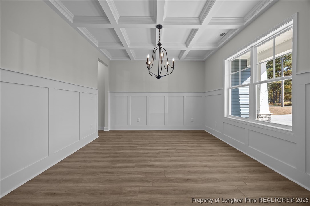 3202 Cameron Hill Road Cameron, NC 28326 - Photo 11 of 45 a view of a room with wooden floor chandelier and windows