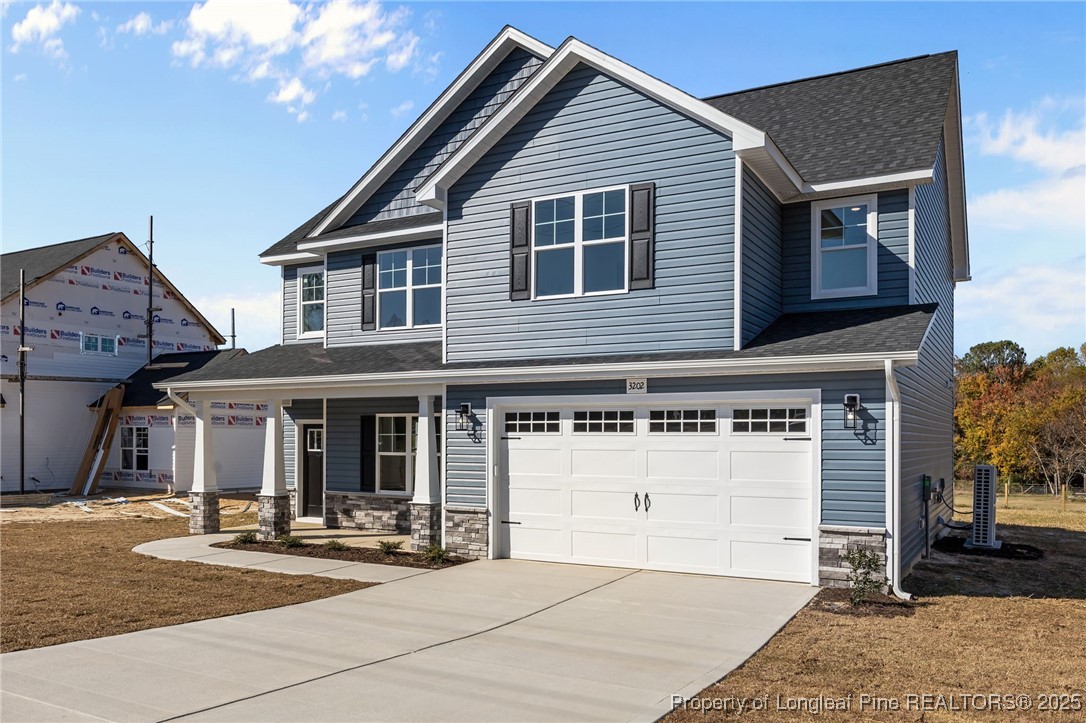 3202 Cameron Hill Road Cameron, NC 28326 - Photo 2 of 45 a front view of a house with yard and outdoor seating